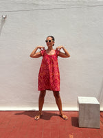 Short frill dress orange/red ikat