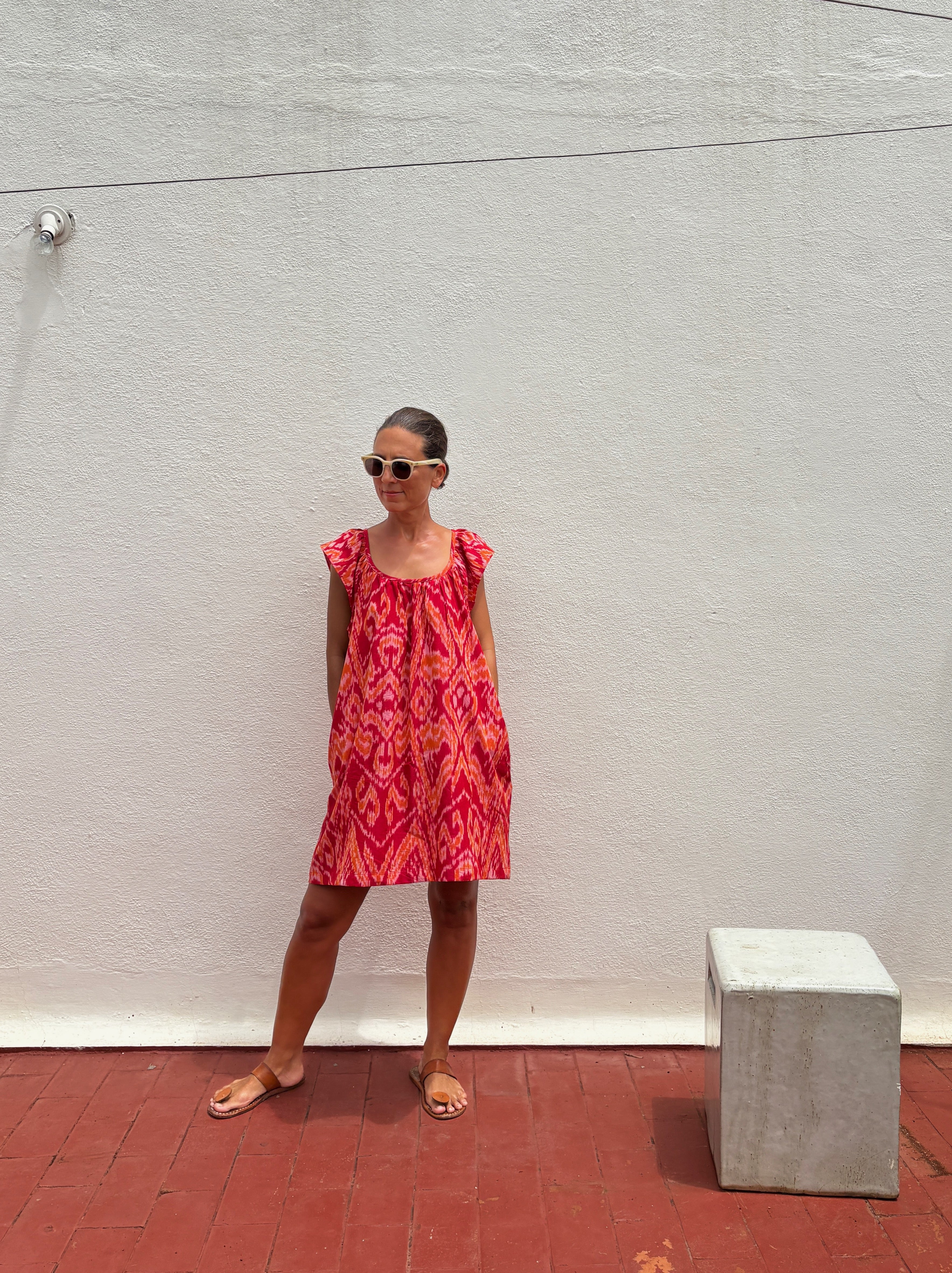 Short frill dress orange/red ikat